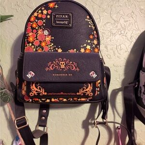 Loungefly Coco Black and Orange Floral Backpack
